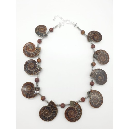 71 - An unusual necklace and earrings set with Jurassic Ammonites (163 million years old) from Madagascar... 