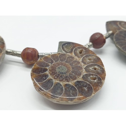 71 - An unusual necklace and earrings set with Jurassic Ammonites (163 million years old) from Madagascar... 