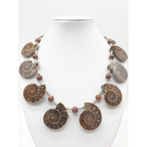 71 - An unusual necklace and earrings set with Jurassic Ammonites (163 million years old) from Madagascar... 