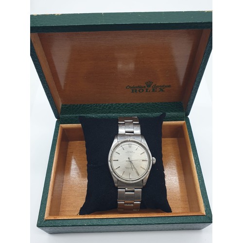 22 - A 70s gents stainless steel ROLEX watch.                                  The watch keeps time, but ... 