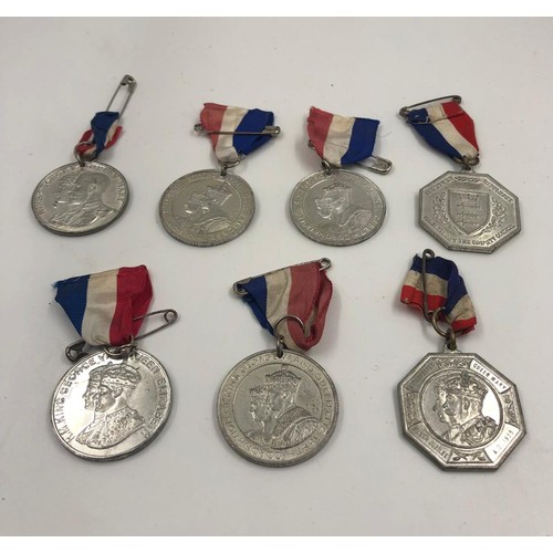 350 - Selection of seven medallions celebrating Royal Jubilee's and Coronations from the 1930s