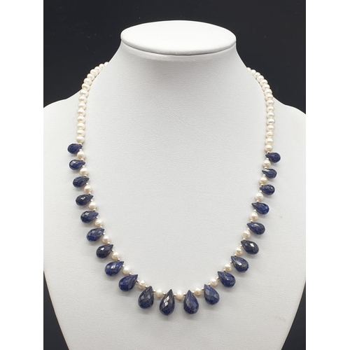 153 - Pearl Necklace with Blue sapphire drop earrings. Total weight 31.02 grams. Necklace length 22cm.