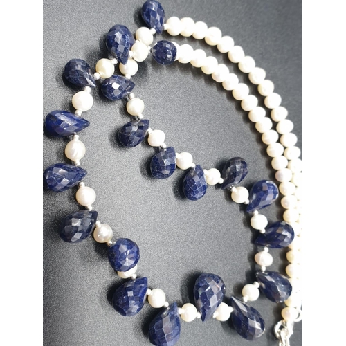 153 - Pearl Necklace with Blue sapphire drop earrings. Total weight 31.02 grams. Necklace length 22cm.