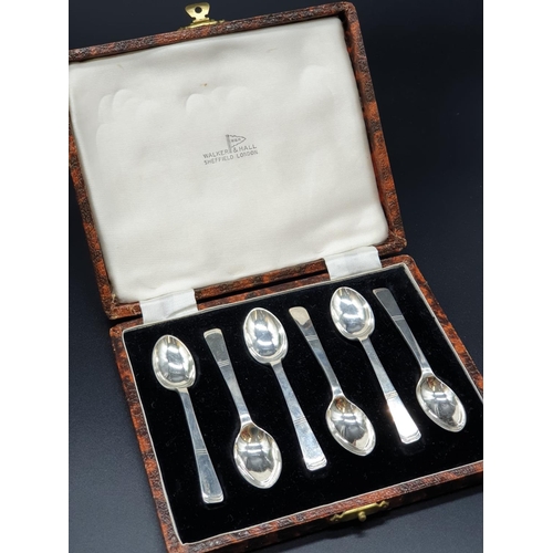 205 - Art Deco style silver spoon set, 1951 Walker and Hall. Spoon length 9cm. Total weight 58 grams.