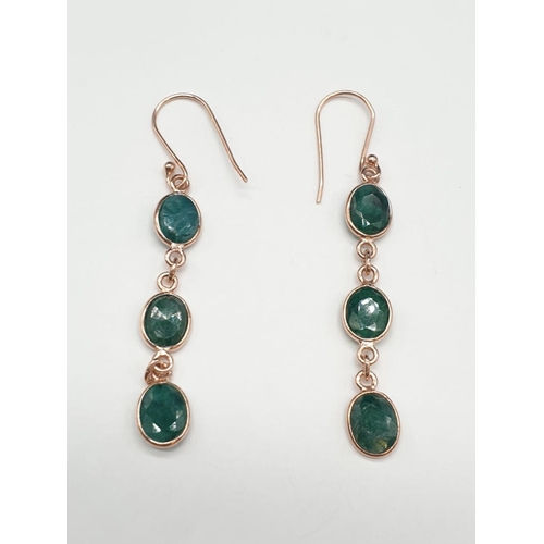 207 - Emerald Bracelet and Dangler earrings in rose gold finish and one cabochon emerald ring. Length of b... 