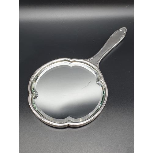 209 - Silver Zeesung 1900 Chinese hand mirror, hand chased with bevelled glass. 30 cm in length.