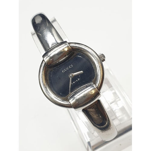 210 - 1990's Gucci 1400L Stainless Steel Women's Petite Quartz Watch, New Battery. Full working order.