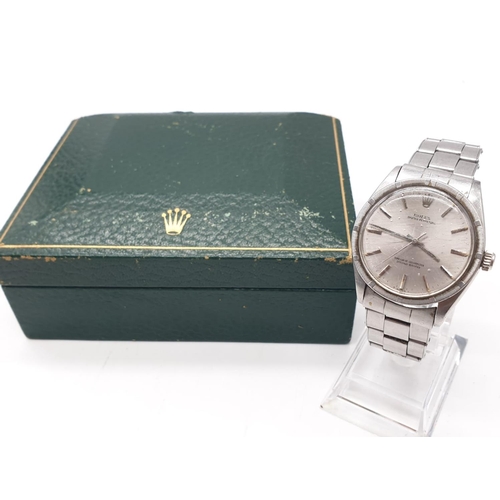 22 - A 70s gents stainless steel ROLEX watch.                                  The watch keeps time, but ... 