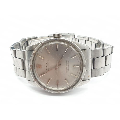 22 - A 70s gents stainless steel ROLEX watch.                                  The watch keeps time, but ... 