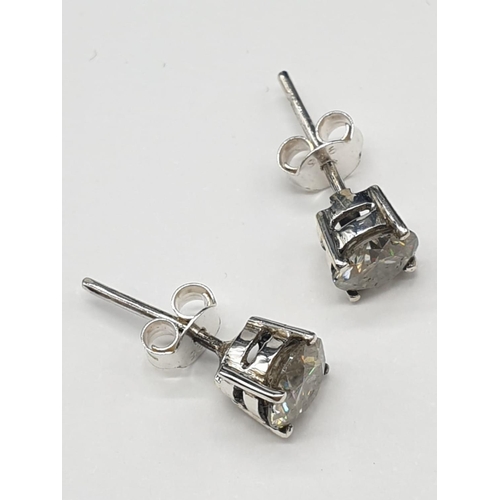 221 - 1.80cts White Moissanite Stone Stud Earrings in Sterling Silver with butterfly clips. Weight 1.63 gr... 