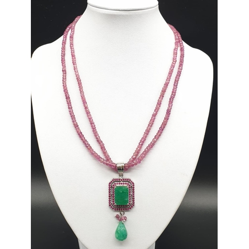 235 - Two Row Ruby necklace with Emerald Pendant with emerald Drop in sterling silver. Emerald weight in p... 