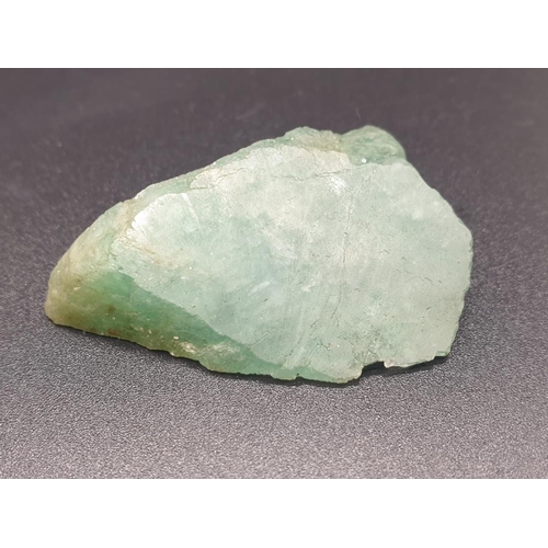 295 - 76.80Ct Natural Emerald. Rough shape. ITLGR certified