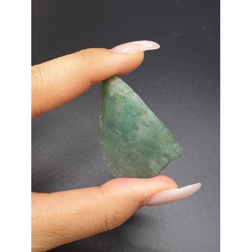 295 - 76.80Ct Natural Emerald. Rough shape. ITLGR certified