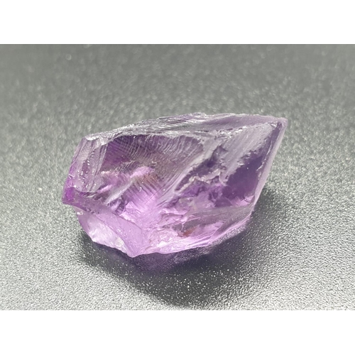 308 - 20.21 Ct Loose Natural Amethyst. Rough shape. IDT certified