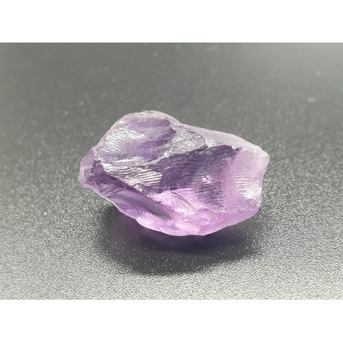 308 - 20.21 Ct Loose Natural Amethyst. Rough shape. IDT certified