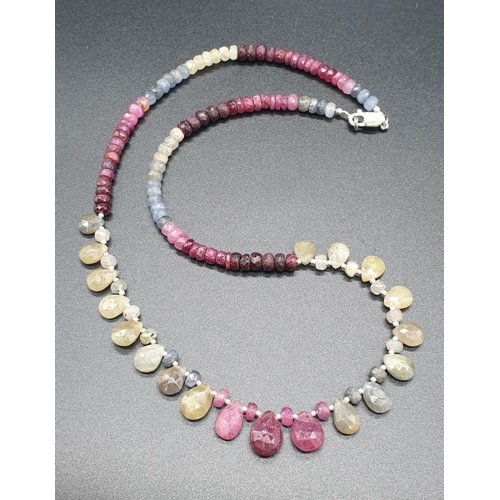 319 - A Multi-sapphire Drops necklace . Length of necklace 23cm. Weight 30.41 grams.