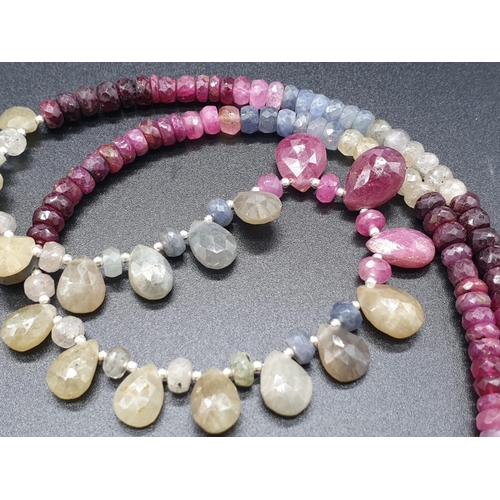 319 - A Multi-sapphire Drops necklace . Length of necklace 23cm. Weight 30.41 grams.