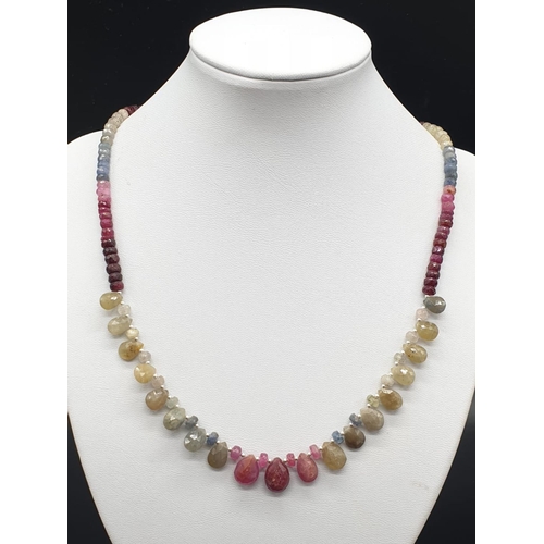 319 - A Multi-sapphire Drops necklace . Length of necklace 23cm. Weight 30.41 grams.