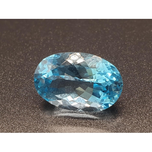 322 - 11.47 Ct Blue Topaz. Oval shape. IDT certified