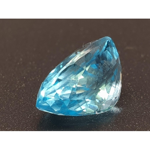 322 - 11.47 Ct Blue Topaz. Oval shape. IDT certified