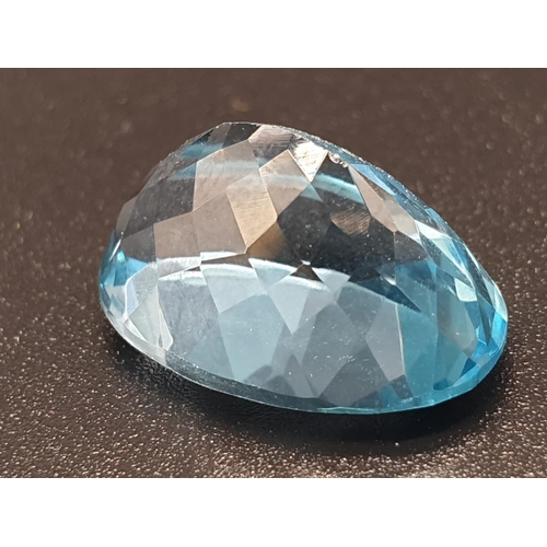 322 - 11.47 Ct Blue Topaz. Oval shape. IDT certified