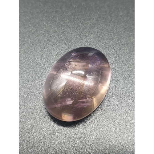 323 - 40.48 Ct Natural Ametrine. Oval cabochon. ITLGR certified