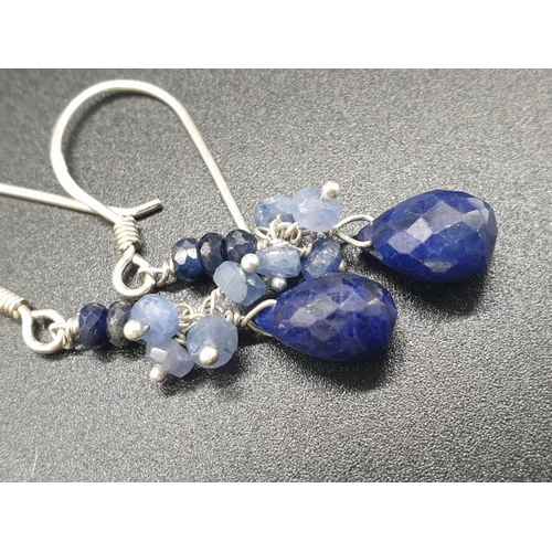 340 - A shaded Blue sapphire Necklace with a sapphire drop and matching dangler earrings. Necklace length ... 