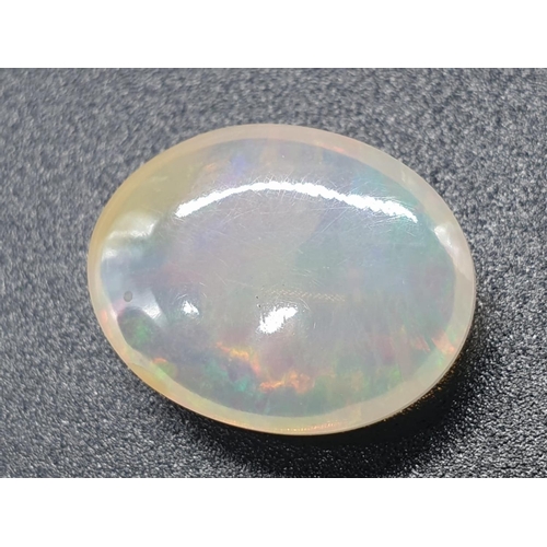 400 - 4.88 Ct Fire Opal. Oval cabochon. IGITL certified