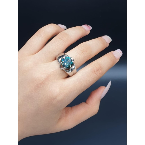 404 - 4.2cts Blue Moissanite ring in Sterling Silver. Ring size U. Weight 6.1 grams.