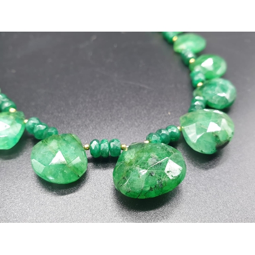 418 - An Emerald Drops Necklace with 925 silver gold plated clasp. Length 22cm, weight 28 grams.