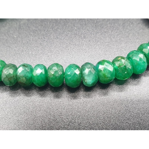 479 - An emerald bracelet with vintage diamond bead. Length 20cm. Weight 17.33 grams.