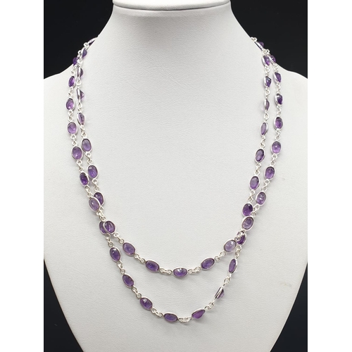 486 - Amethyst Gemstone Chain Necklace in Sterling Silver. 36 inches long. Weight 22.87 grams.