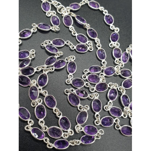 486 - Amethyst Gemstone Chain Necklace in Sterling Silver. 36 inches long. Weight 22.87 grams.