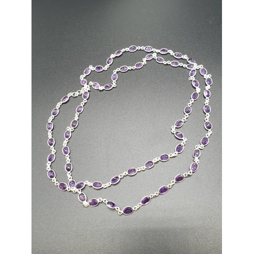 486 - Amethyst Gemstone Chain Necklace in Sterling Silver. 36 inches long. Weight 22.87 grams.