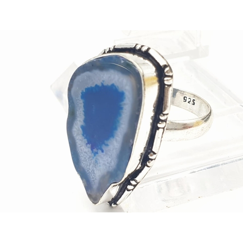 92 - A necklace, bracelet and ring set with blue agate from Botswana, in a presentation case. Necklace le... 