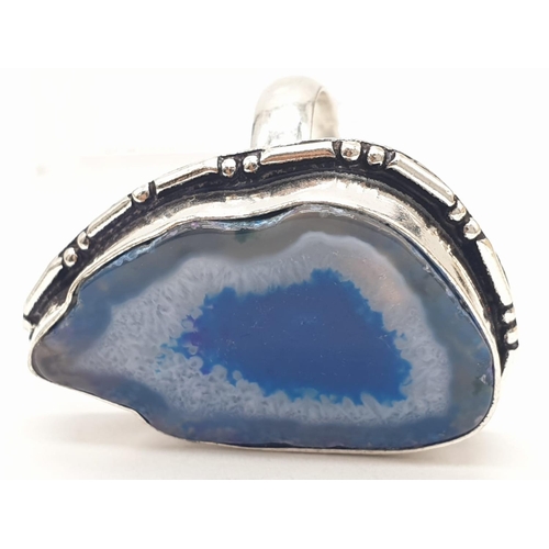 92 - A necklace, bracelet and ring set with blue agate from Botswana, in a presentation case. Necklace le... 