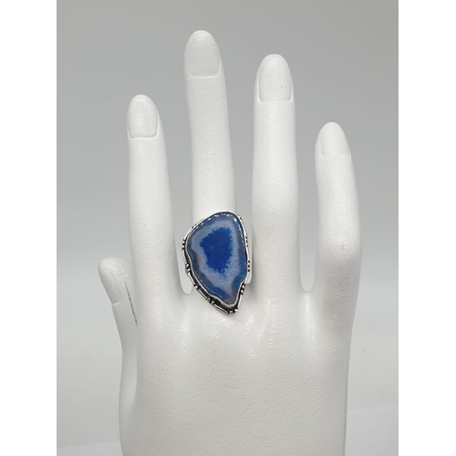 92 - A necklace, bracelet and ring set with blue agate from Botswana, in a presentation case. Necklace le... 