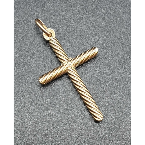 220 - 9ct Gold Modern Cross 1.8g 3cms