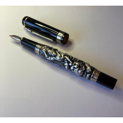 134 - Jinhao fountain pen in black with tiger detail in relief. Having 18ct gold plated nib. Perfect condi... 