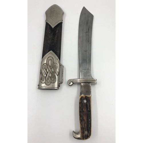 51 - German WW2 RAD subordinate Hewer dagger with stags horn grip, stylised eagle pommel in original scab... 