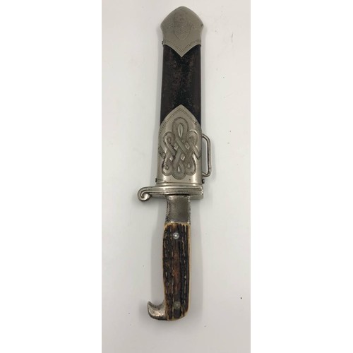 51 - German WW2 RAD subordinate Hewer dagger with stags horn grip, stylised eagle pommel in original scab... 