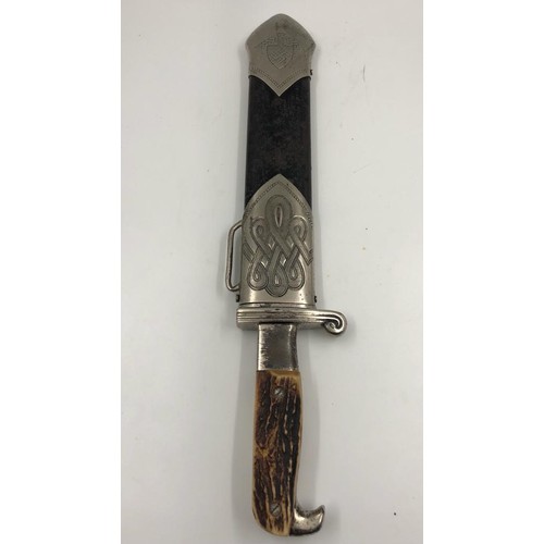 51 - German WW2 RAD subordinate Hewer dagger with stags horn grip, stylised eagle pommel in original scab... 