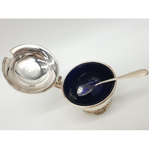 129 - Asprey  London Silver Condiment pot and spoon, weight 197g and 9cm tall approx