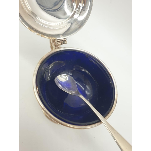 129 - Asprey  London Silver Condiment pot and spoon, weight 197g and 9cm tall approx