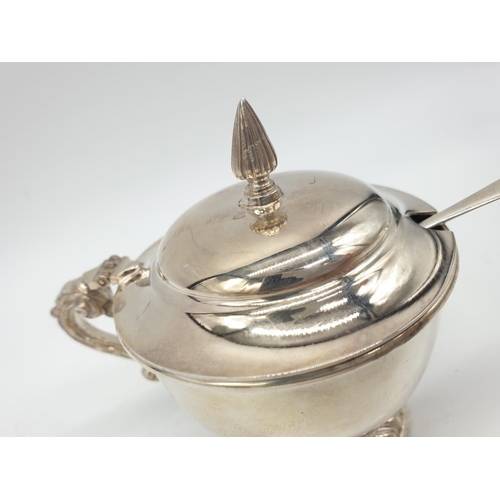 129 - Asprey  London Silver Condiment pot and spoon, weight 197g and 9cm tall approx