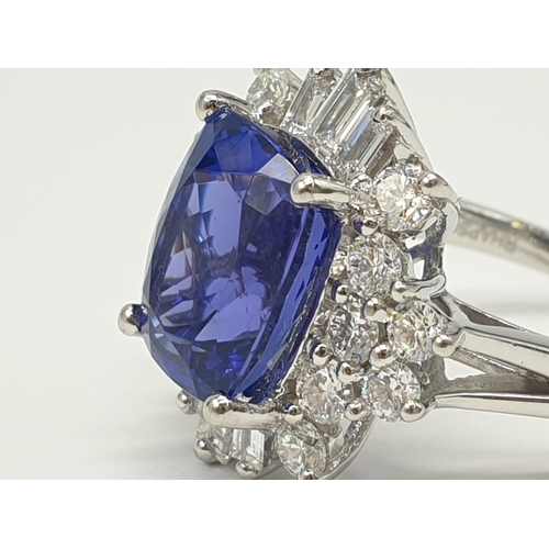 154 - 950 platinum diamond in 1.3kt tanzanite art deco style ring. 11.7g and size O.