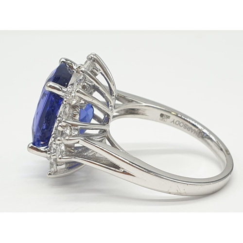 154 - 950 platinum diamond in 1.3kt tanzanite art deco style ring. 11.7g and size O.