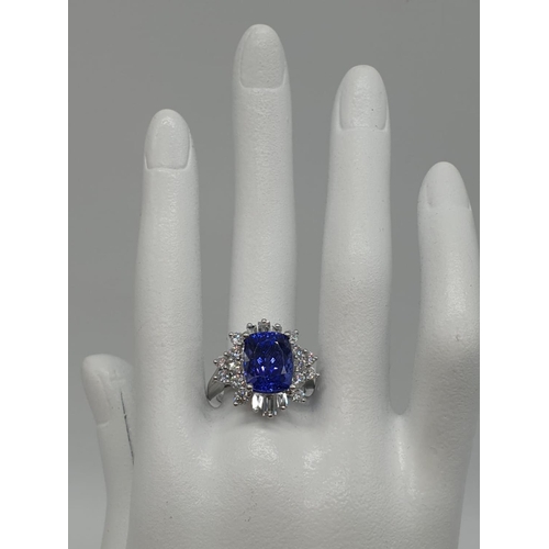 154 - 950 platinum diamond in 1.3kt tanzanite art deco style ring. 11.7g and size O.