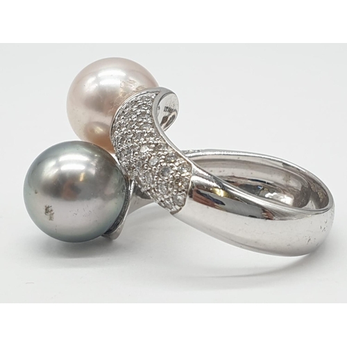 161 - 14ct diamond encrusted ring with 2 different coloured south sea pearls. Weighs 9.2g and is a size O.