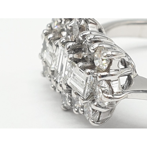 168 - 18ct white gold and diamond ring. Size M and weighs 4.6g.